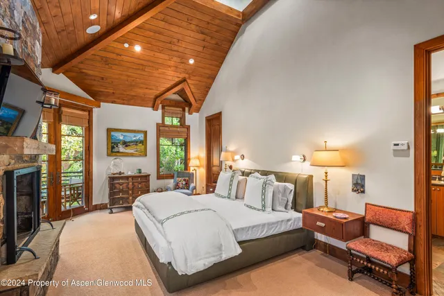 a view of a house with a tree