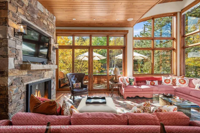 a kitchen with lots of counter top space and wooden floor