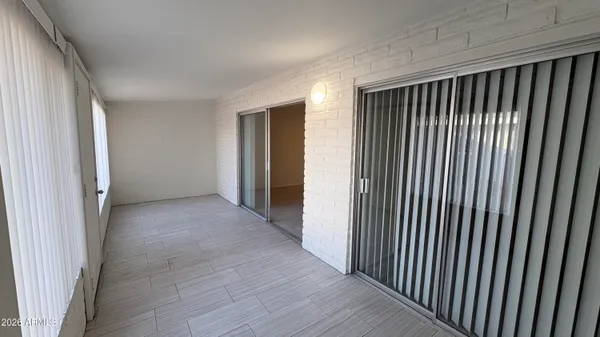 a view of a livingroom with wooden floor