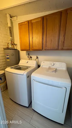 a view of utility room with washer and dryer