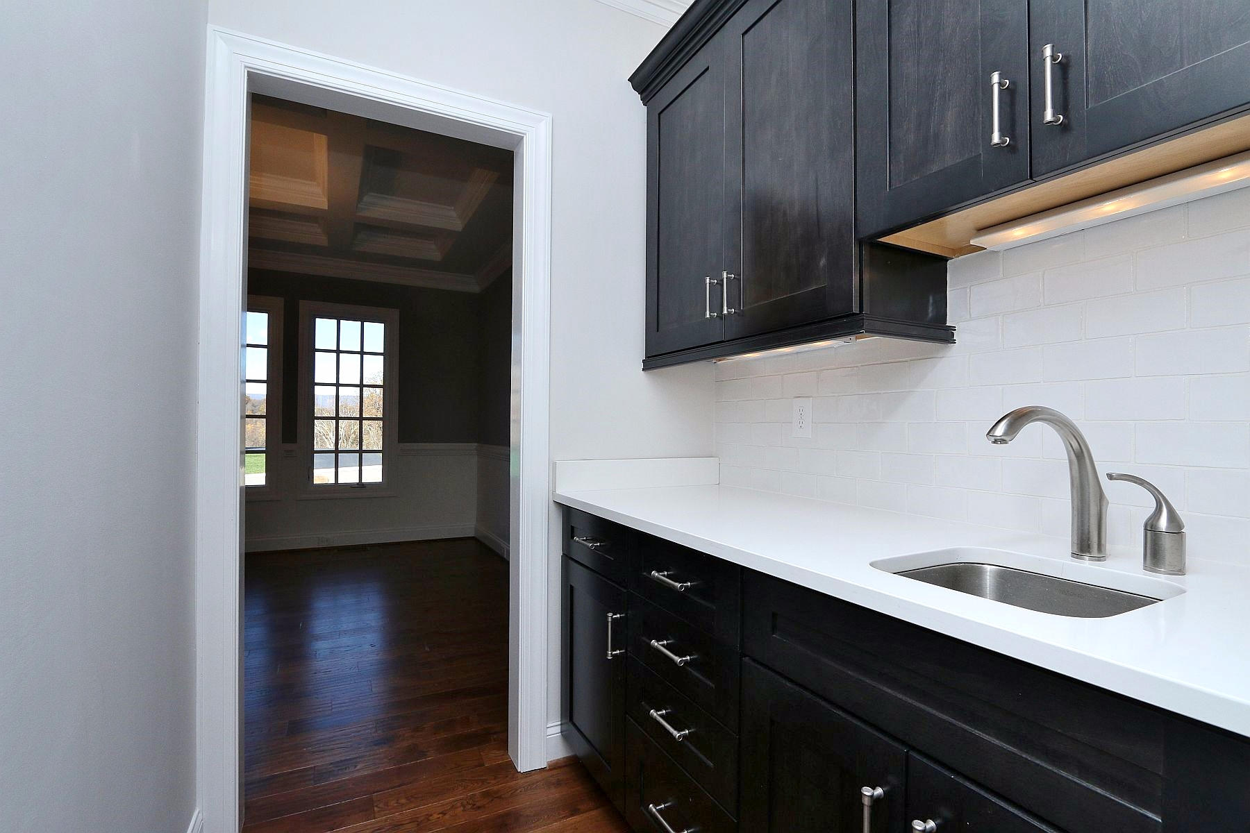 6875 Fairway Ridge Road Salem, VA 24153 - Photo 11 of 91 a kitchen with a sink and cabinets