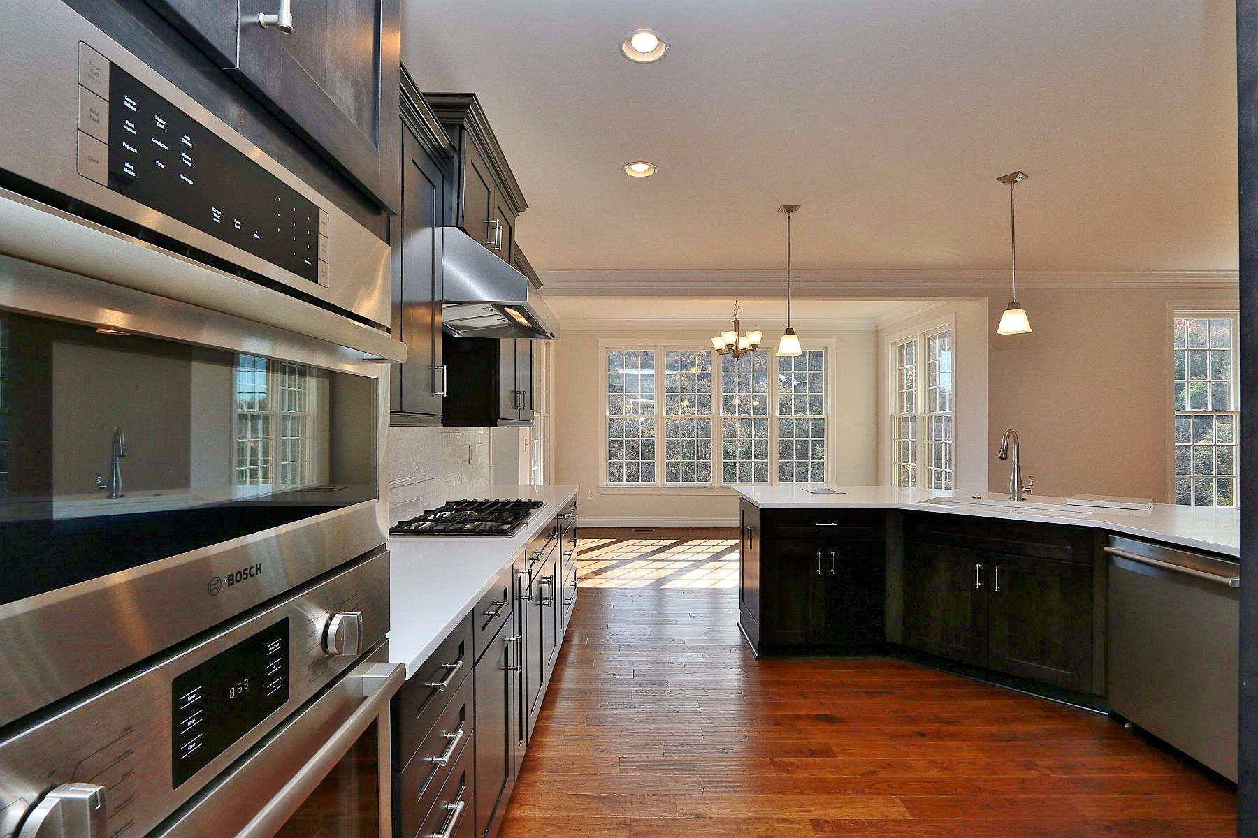 6875 Fairway Ridge Road Salem, VA 24153 - Photo 12 of 91 a kitchen with stainless steel appliances granite countertop a sink and stove
