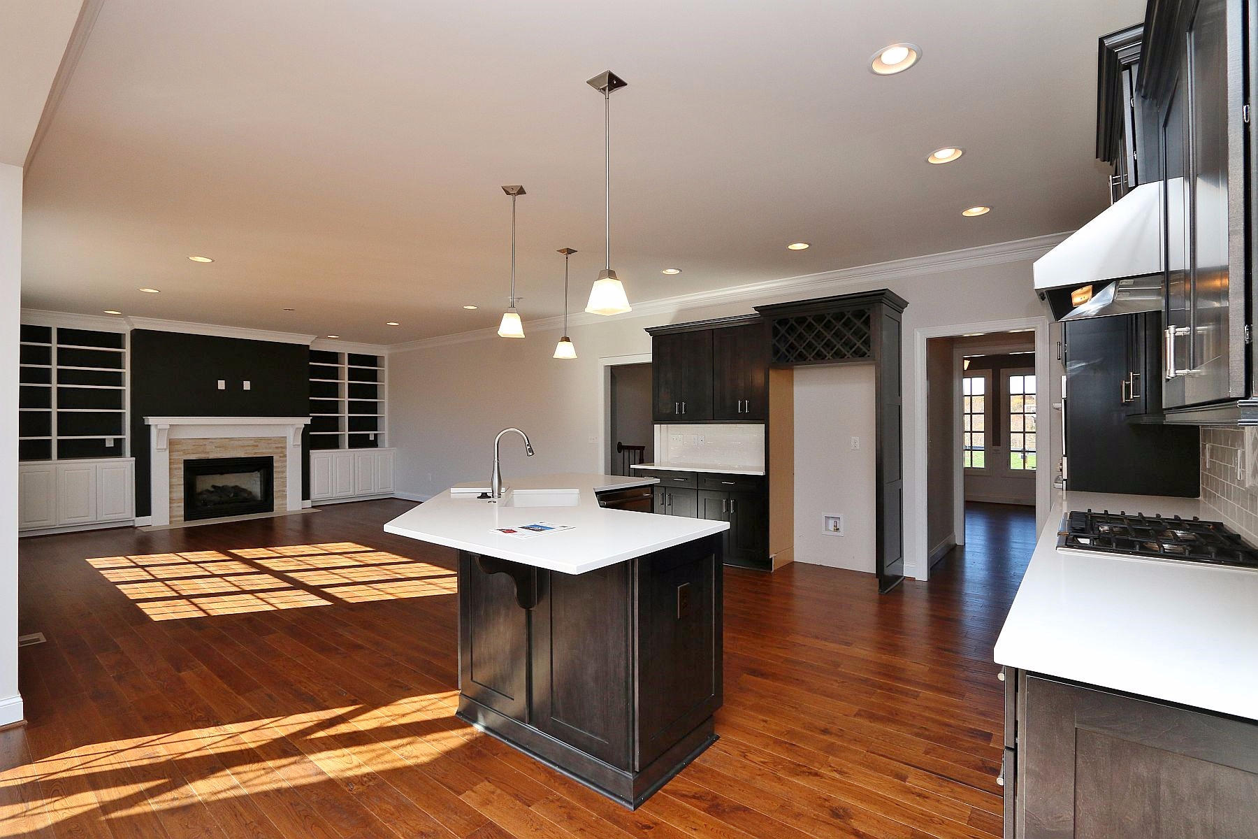 6875 Fairway Ridge Road Salem, VA 24153 - Photo 18 of 91 a large kitchen with stainless steel appliances kitchen island granite countertop a stove a sink a table and chairs