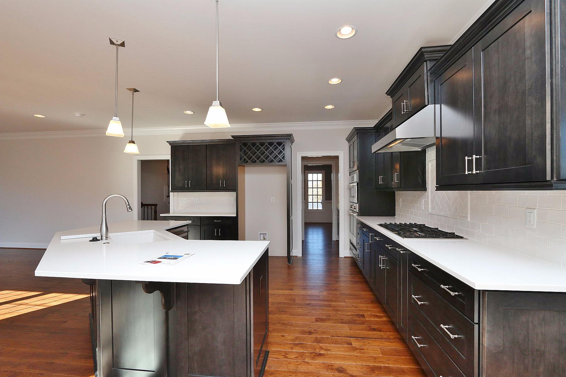 6875 Fairway Ridge Road Salem, VA 24153 - Photo 19 of 91 a kitchen with a sink a counter space and wooden floor