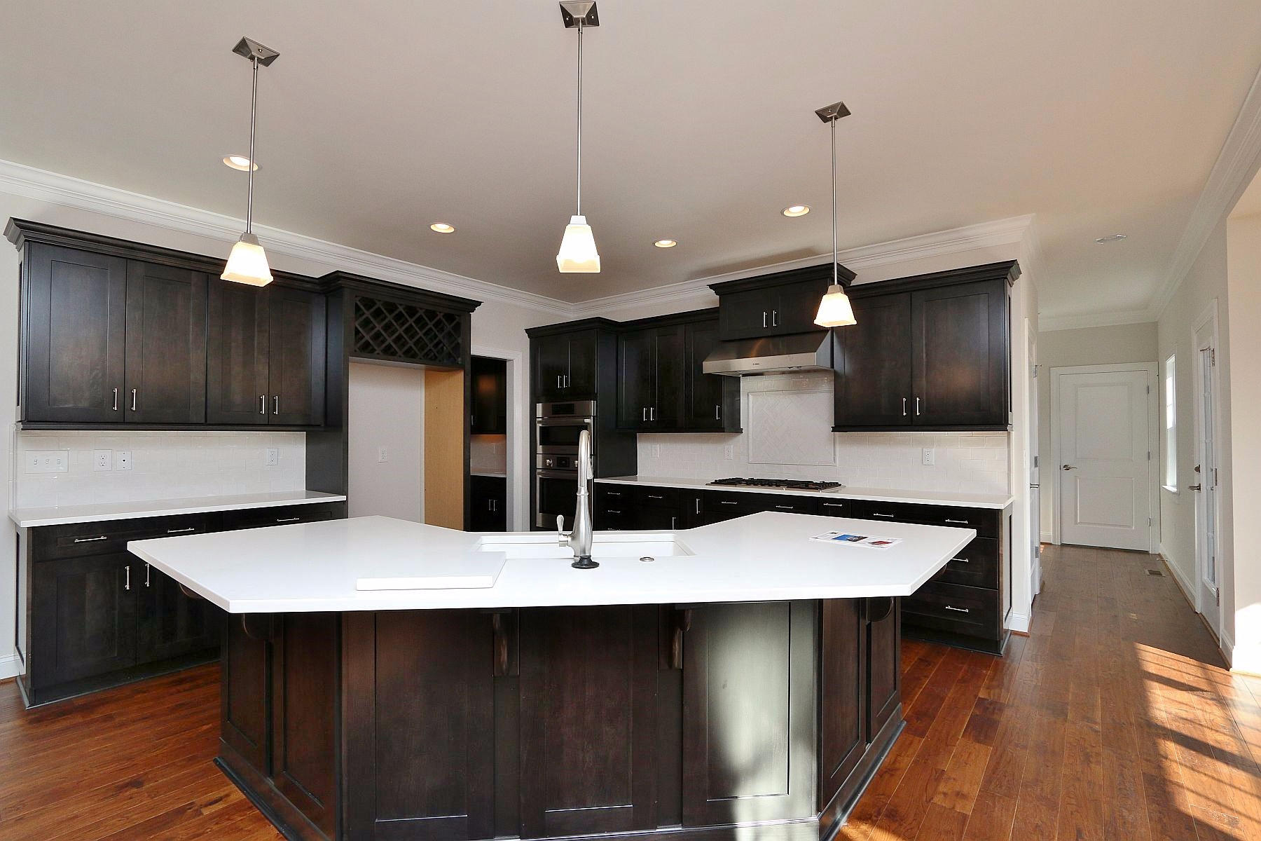 6875 Fairway Ridge Road Salem, VA 24153 - Photo 20 of 91 a kitchen with a table chairs refrigerator and microwave