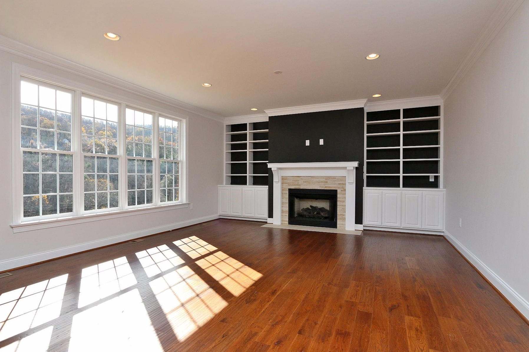 6875 Fairway Ridge Road Salem, VA 24153 - Photo 25 of 91 a view of an empty room with wooden floor and a window
