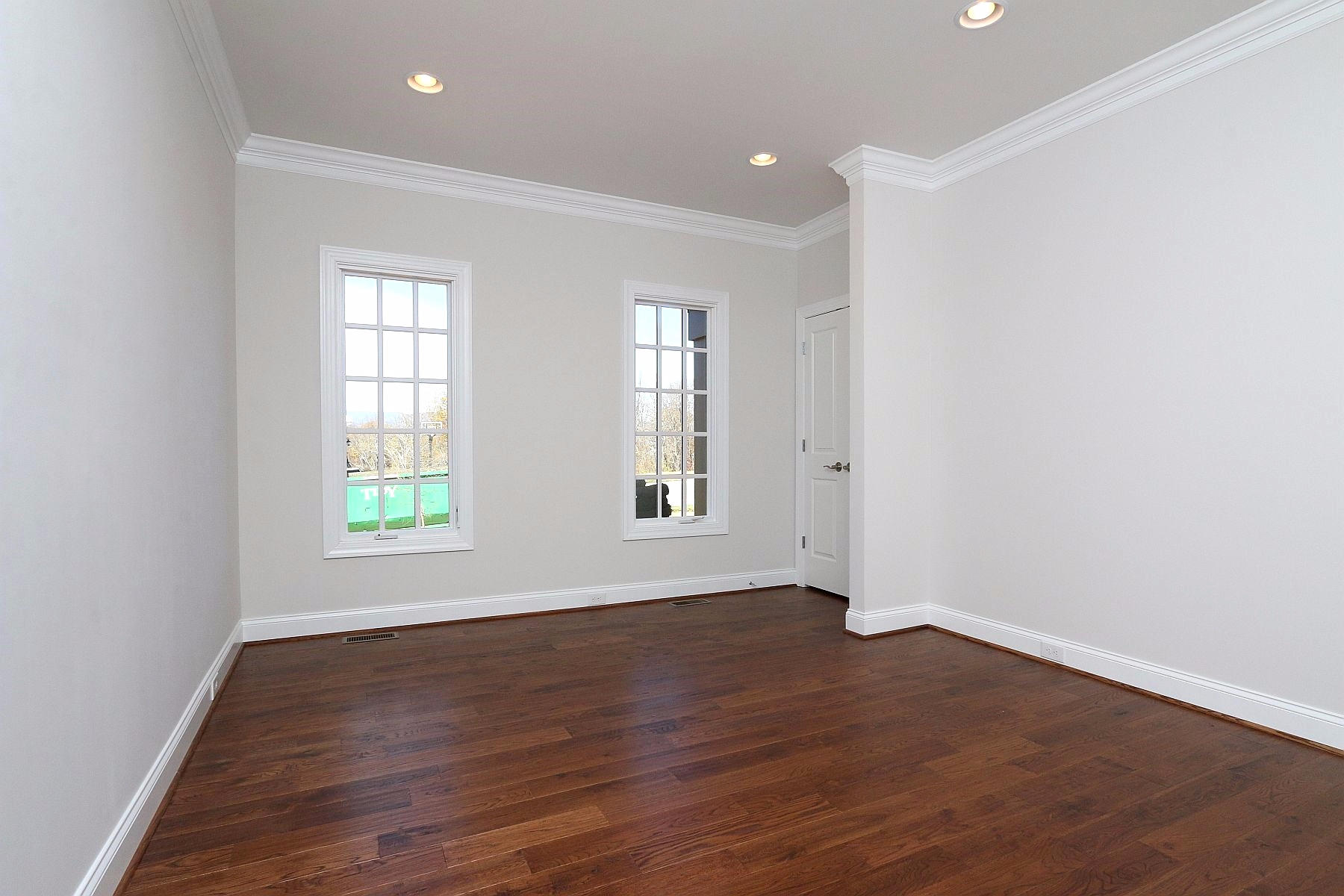 6875 Fairway Ridge Road Salem, VA 24153 - Photo 32 of 91 an empty room with wooden floor and windows