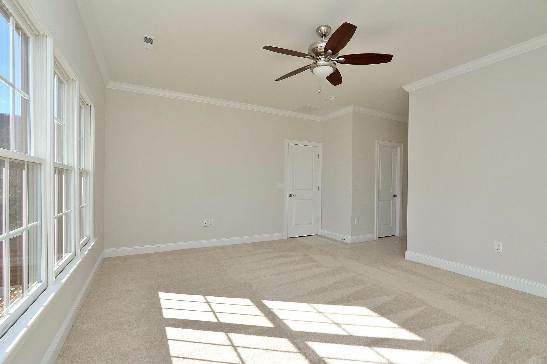 6875 Fairway Ridge Road Salem, VA 24153 - Photo 50 of 91 a view of a room with wooden floor and a ceiling fan