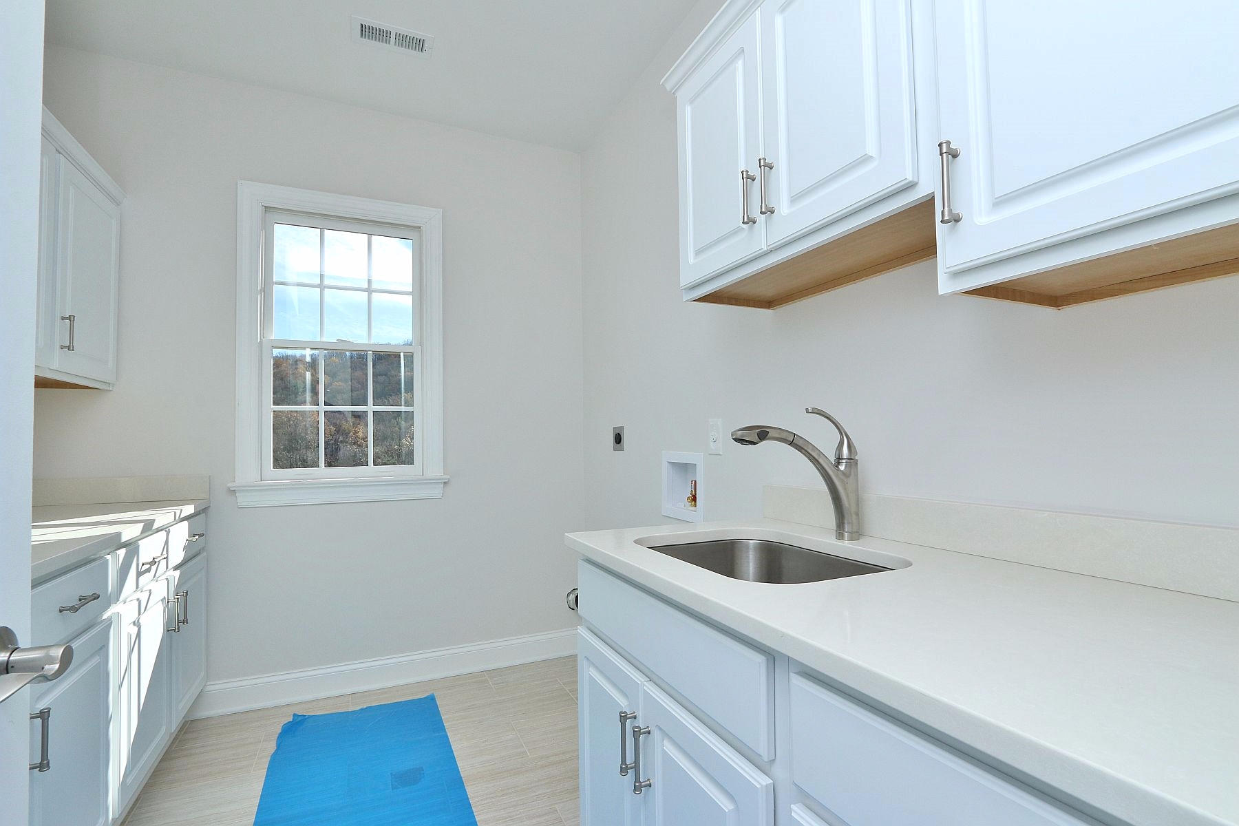 6875 Fairway Ridge Road Salem, VA 24153 - Photo 61 of 91 a kitchen with a sink cabinets and a window