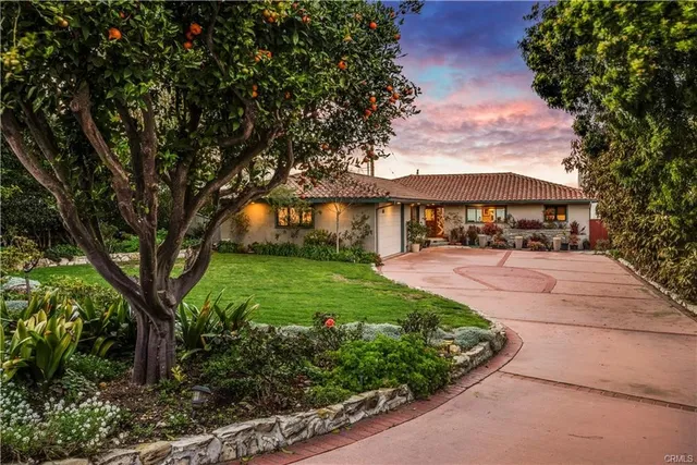 a view of a house with garden