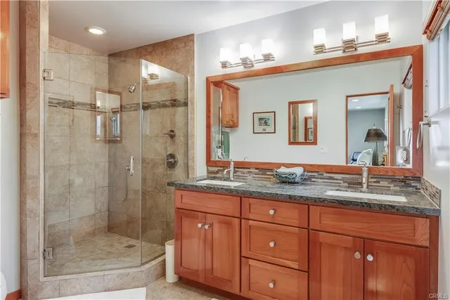 a bedroom with bed and window