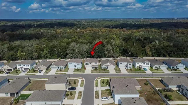 a view of swimming pool with a yard and outdoor seating