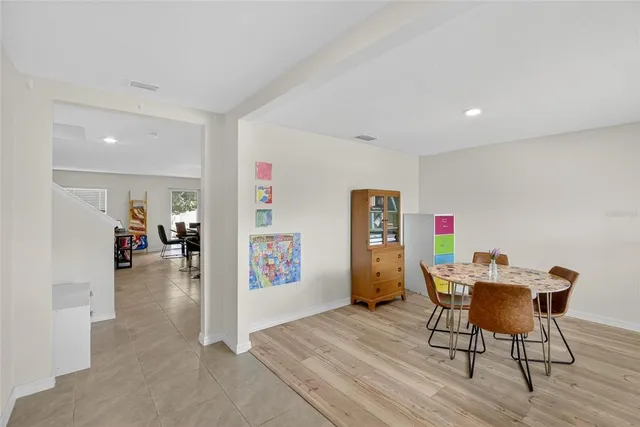 a view of a livingroom with furniture and wooden floor