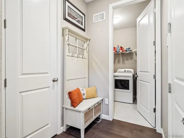 a living room with furniture and a gate