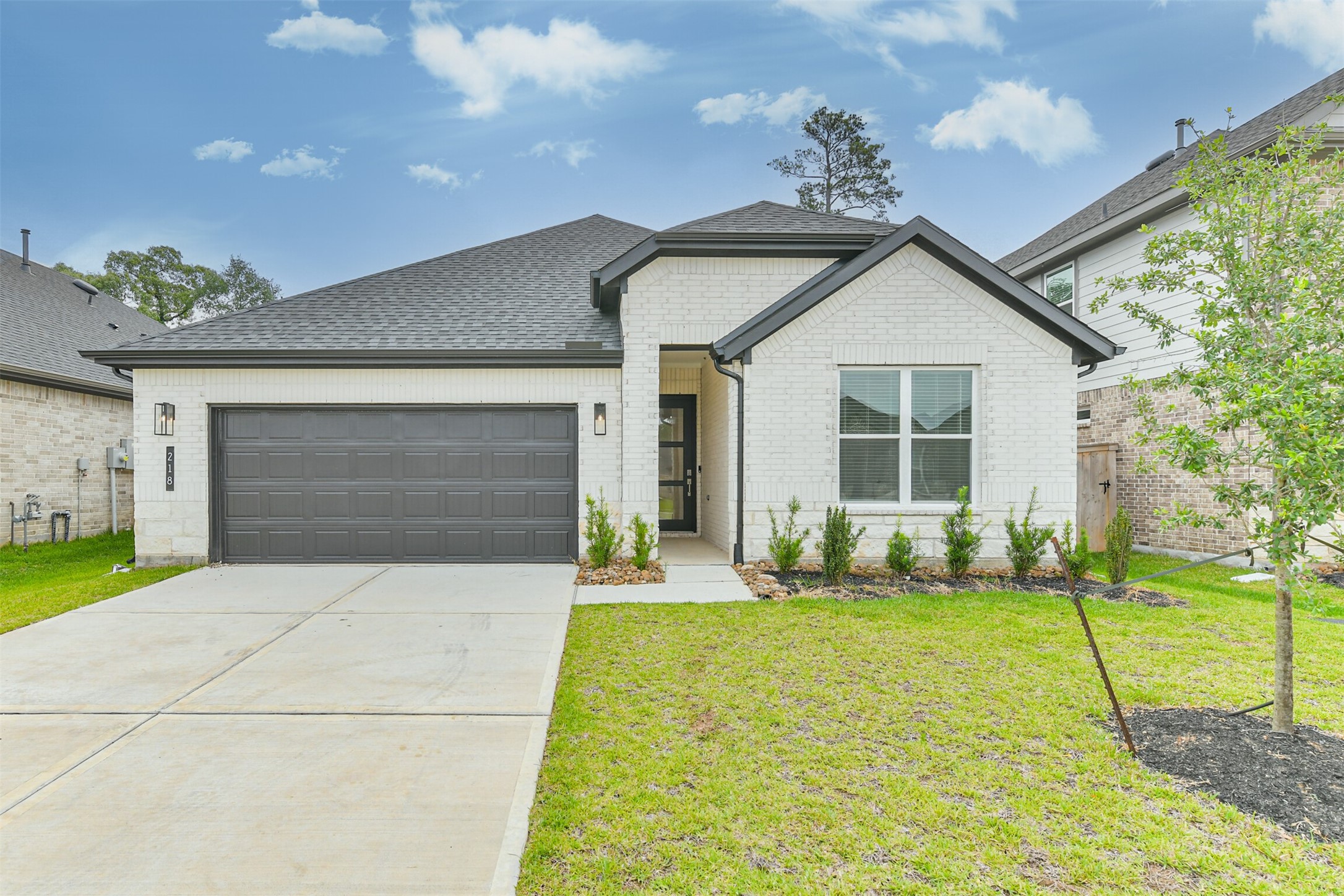 218 Springfield Terrace Drive Conroe, TX 77304 - Photo 1 of 39 Built in 2025 by DR Horton, this modern home has 4 bedrooms and an office/5th bedroom,