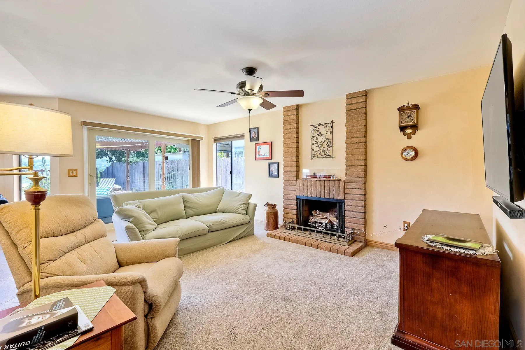 3805 Catamarca Drive San Diego, CA 92124 - Photo 17 of 59 a living room with furniture and fireplace