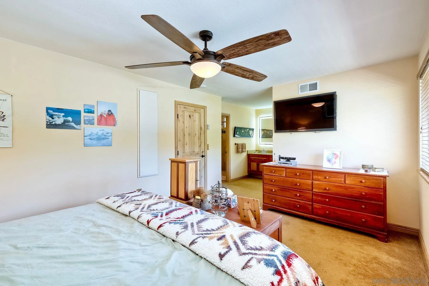 3805 Catamarca Drive San Diego, CA 92124 - Photo 19 of 59 a bedroom with a bed and a flat screen tv