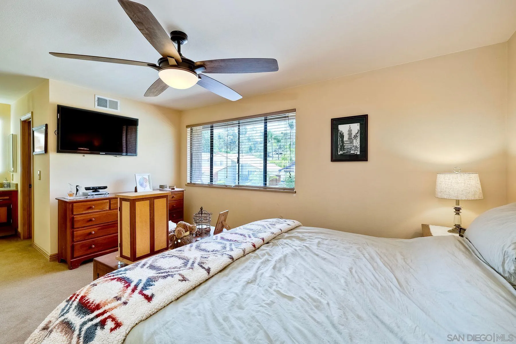 3805 Catamarca Drive San Diego, CA 92124 - Photo 20 of 59 a bedroom with a bed and a flat screen tv