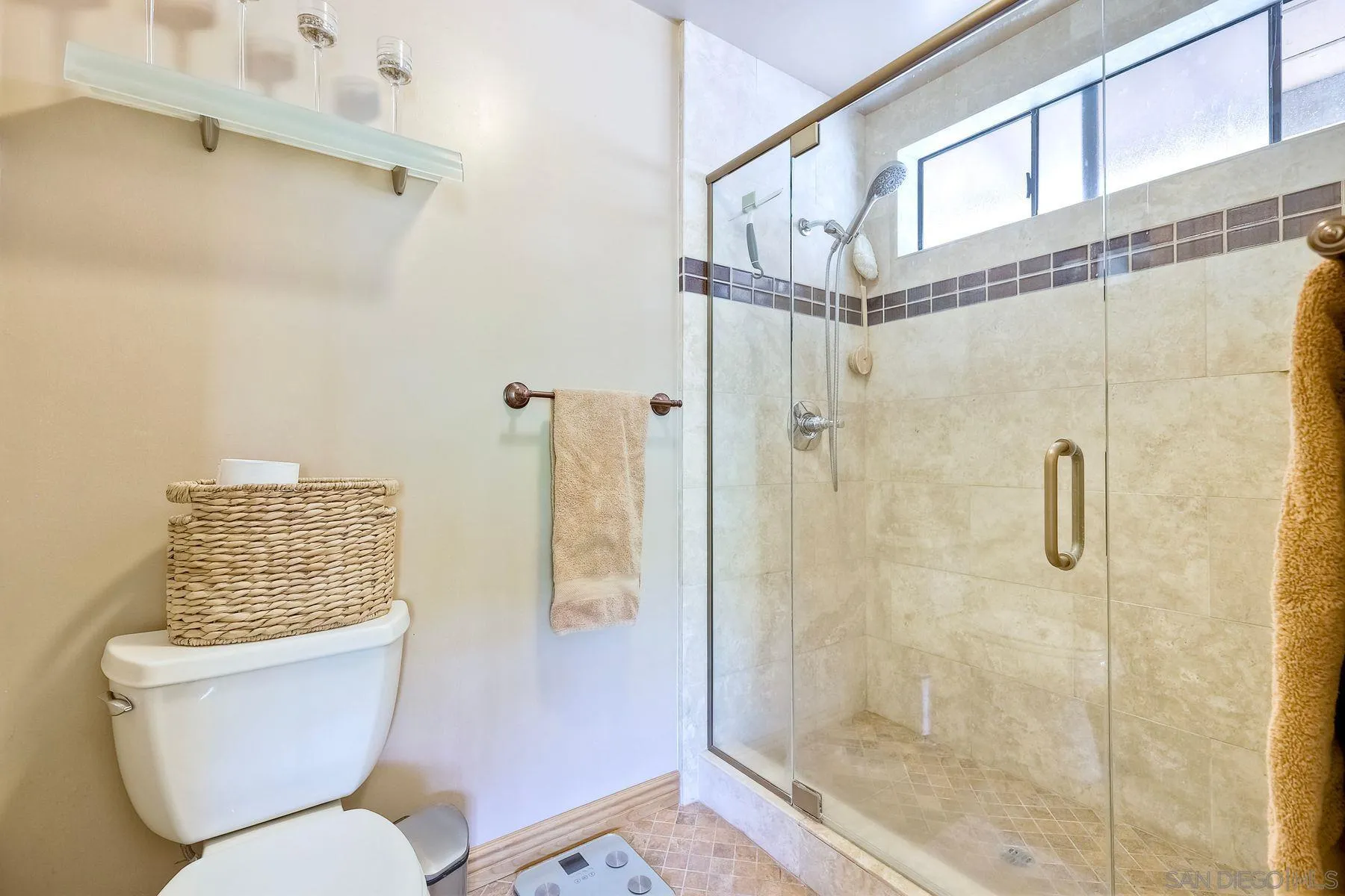 3805 Catamarca Drive San Diego, CA 92124 - Photo 22 of 59 a bathroom with a toilet and shower
