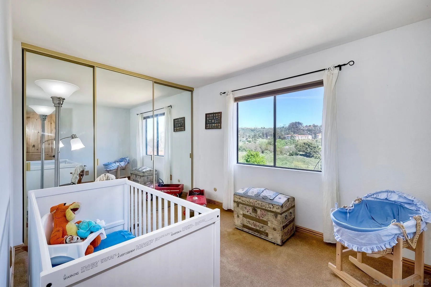 3805 Catamarca Drive San Diego, CA 92124 - Photo 24 of 59 a living room with furniture and a large window