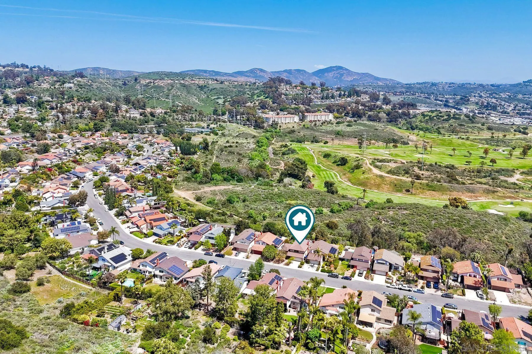 3805 Catamarca Drive San Diego, CA 92124 - Photo 49 of 59 a view of a city with a mountain in the background