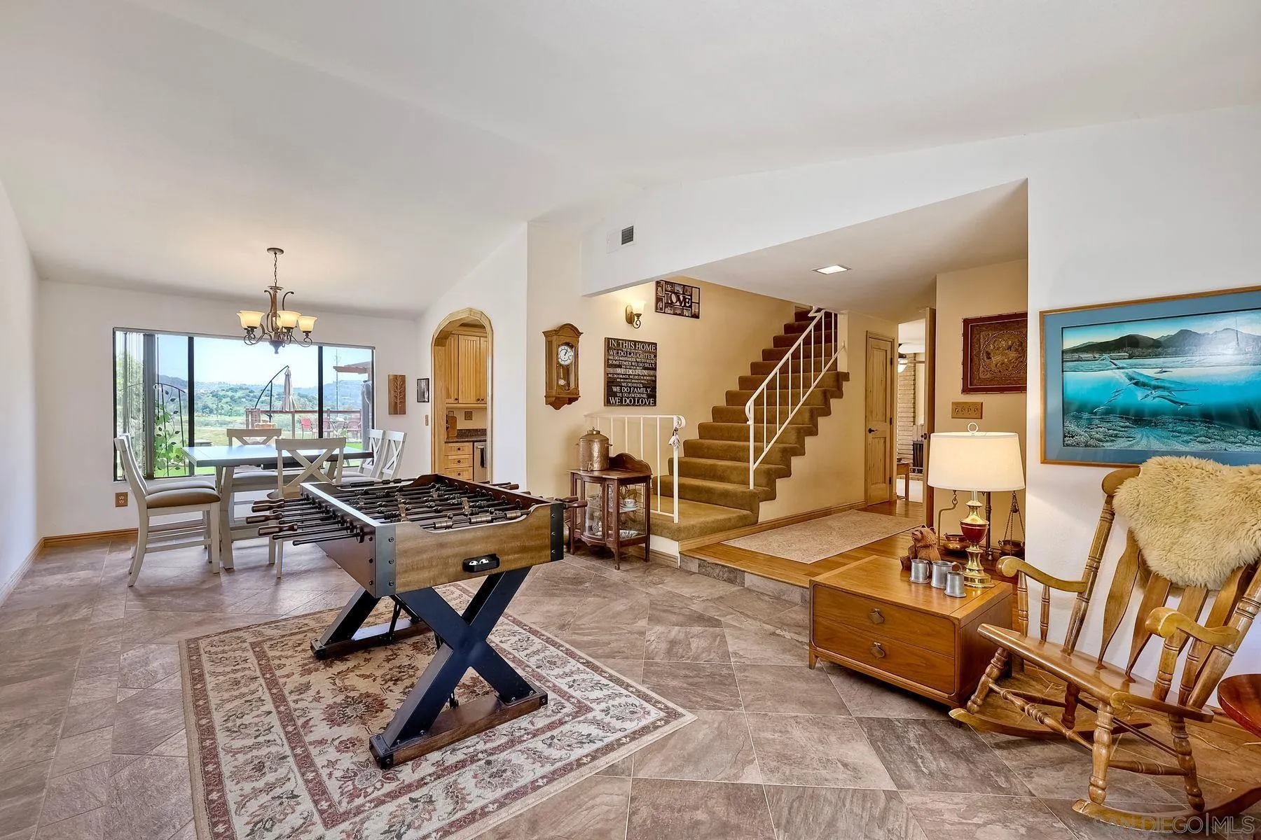 3805 Catamarca Drive San Diego, CA 92124 - Photo 6 of 59 a living room with furniture and wooden floor