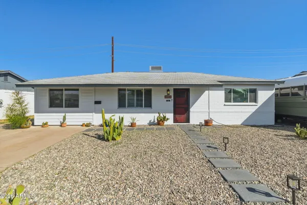 a front view of a house with patio