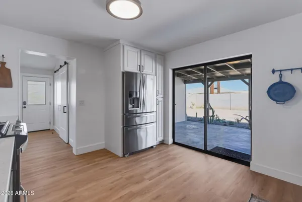 a view of an empty room and window