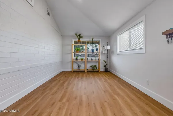 a view of a room with racks on the wall