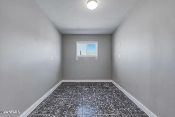 an empty room with a window