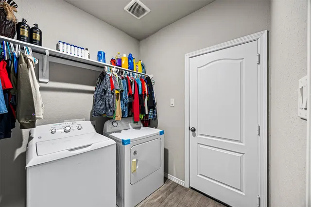 a utility room with dryer and washer