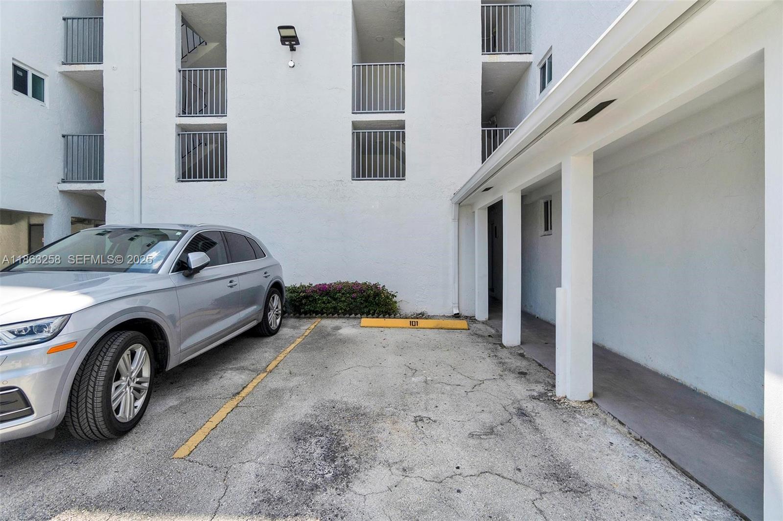 620 Southwest 10th Street, Unit 405 Miami, FL 33130 - Photo 17 of 21 a view of a car in front of a house