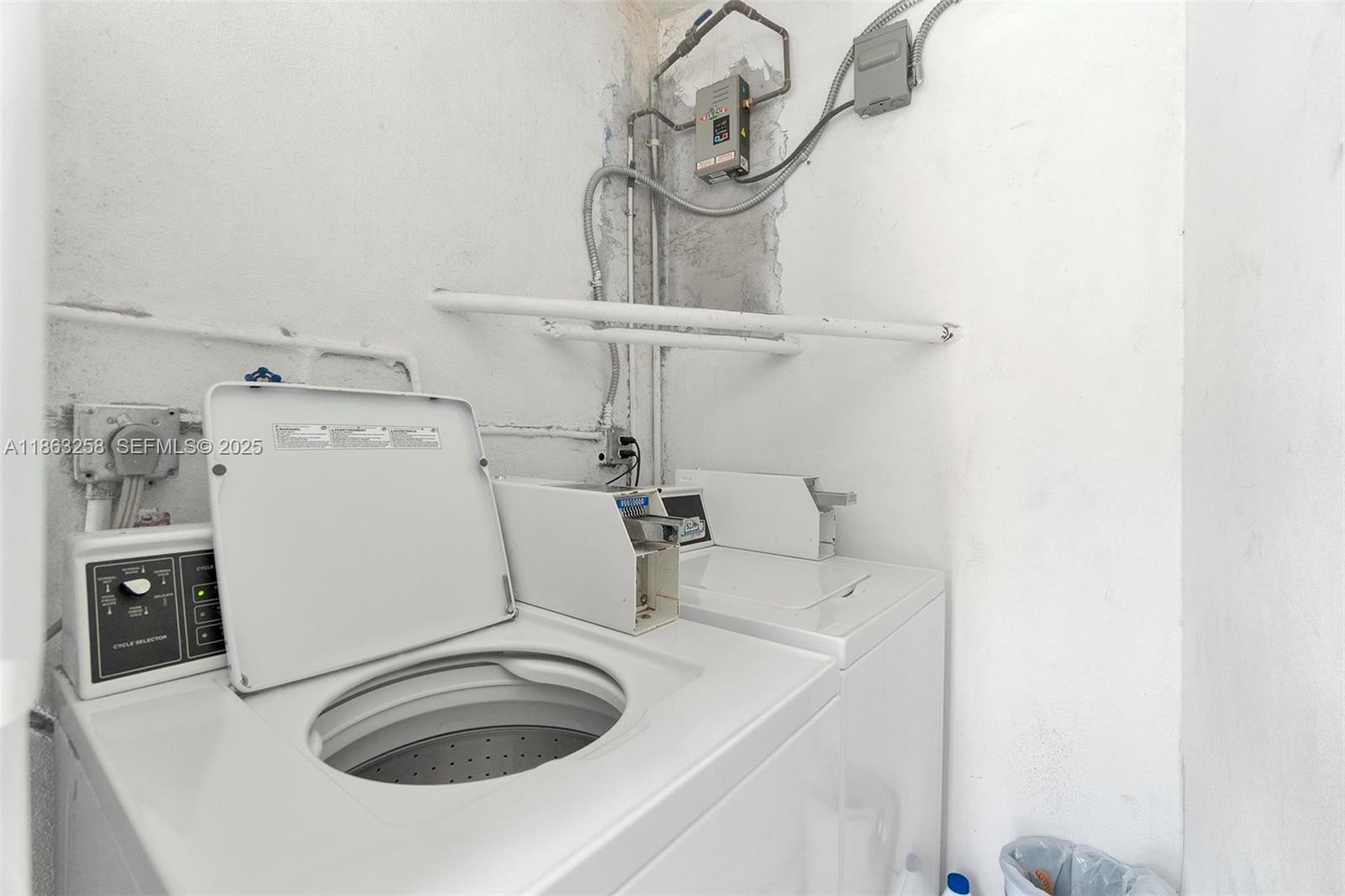 620 Southwest 10th Street, Unit 405 Miami, FL 33130 - Photo 18 of 21 a utility room with dryer and washer