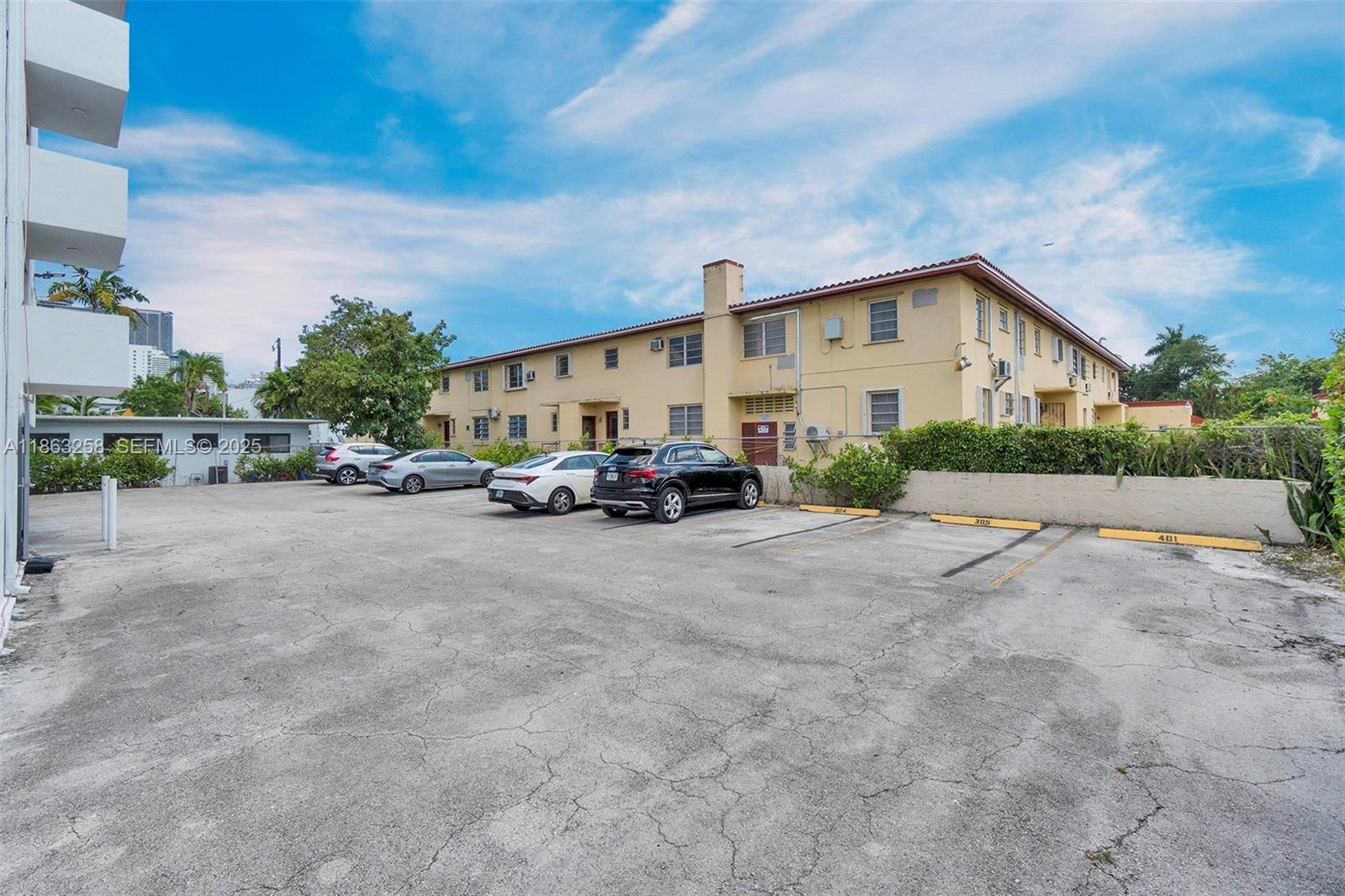 620 Southwest 10th Street, Unit 405 Miami, FL 33130 - Photo 19 of 21 a view of car parked in front of house