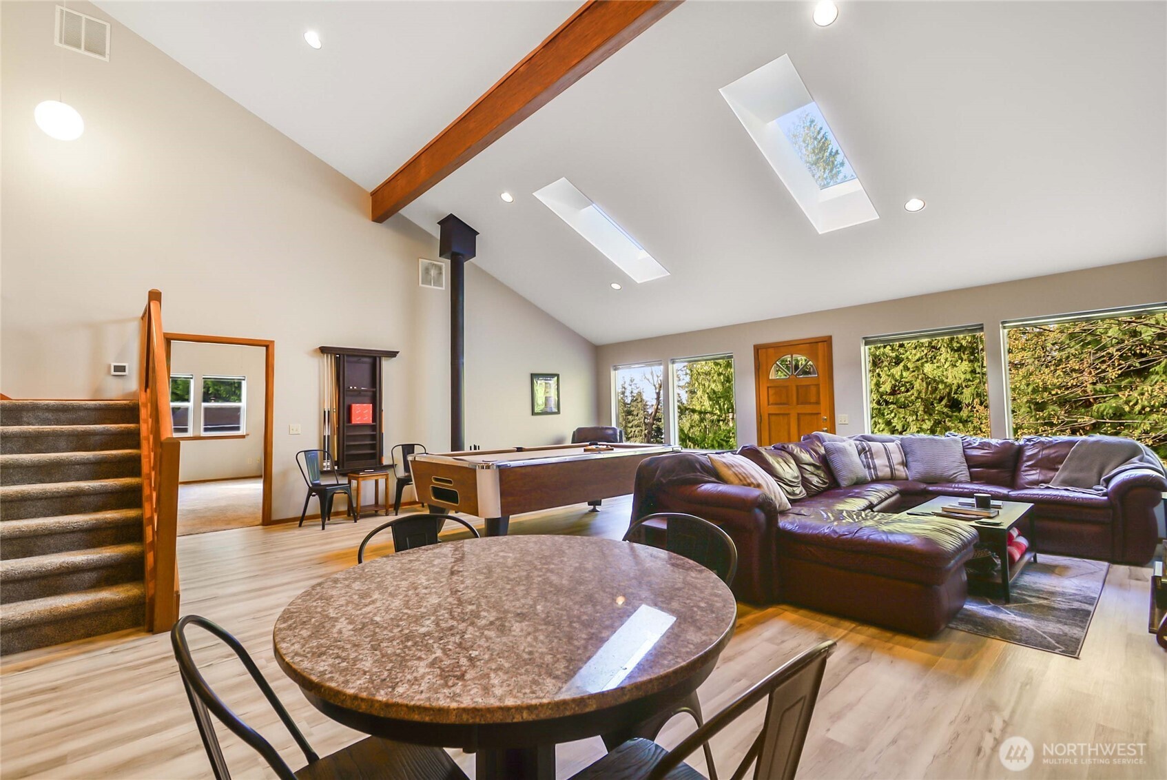 2101 Wagner Road Camano Island, WA 98282 - Photo 11 of 36 a living room with furniture and a large window