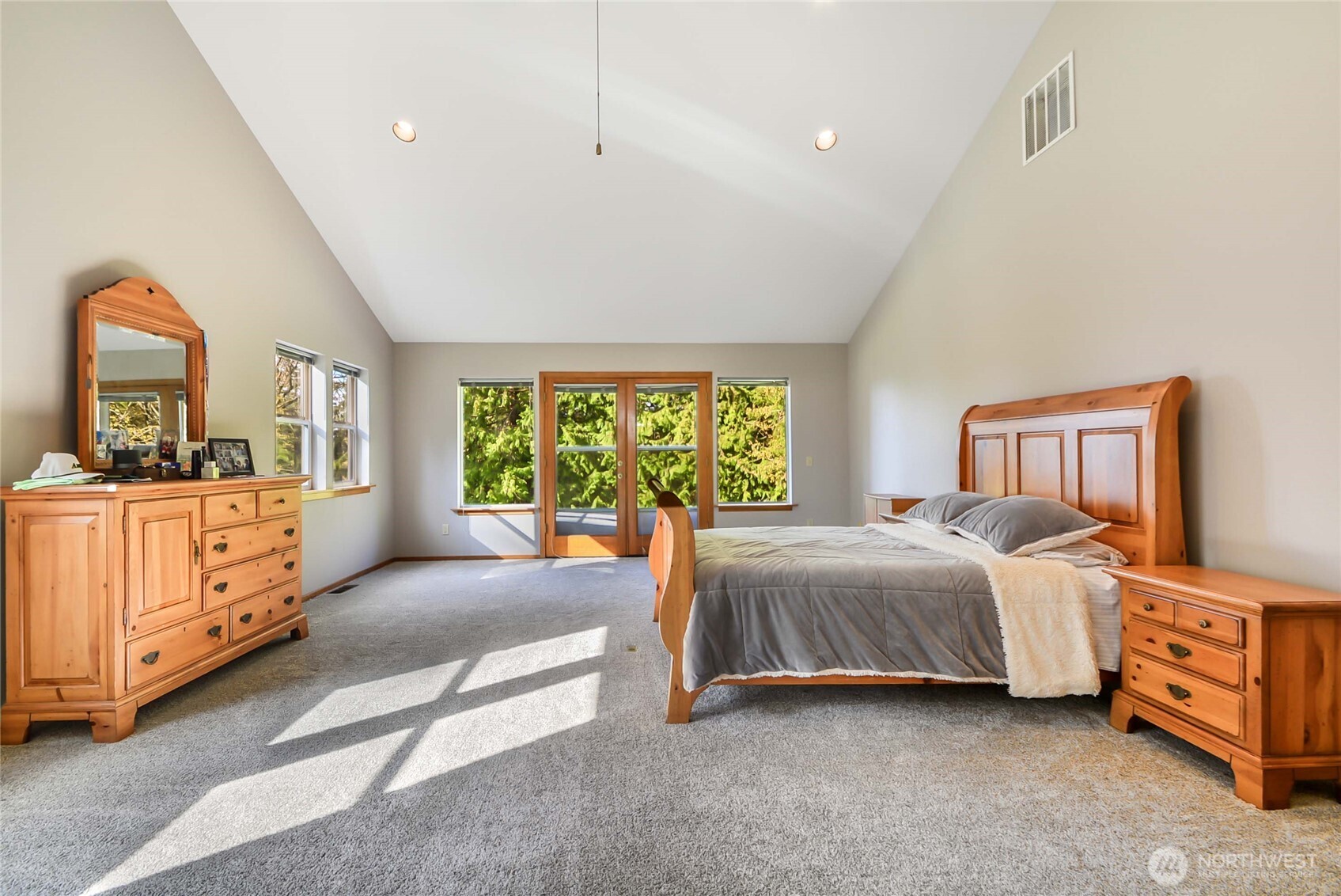 2101 Wagner Road Camano Island, WA 98282 - Photo 13 of 36 a bedroom with a bed and a dresser