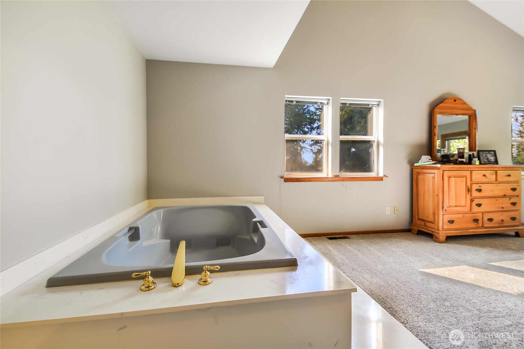 2101 Wagner Road Camano Island, WA 98282 - Photo 15 of 36 a room with a couch and a window