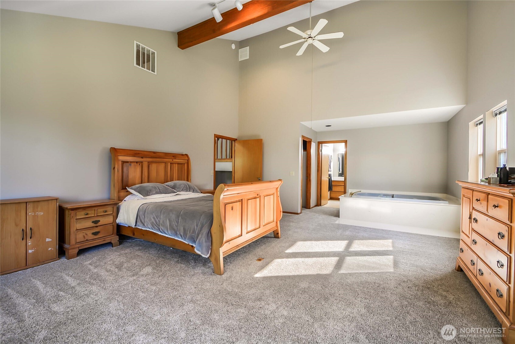 2101 Wagner Road Camano Island, WA 98282 - Photo 16 of 36 a bedroom with a bed and a cabinets