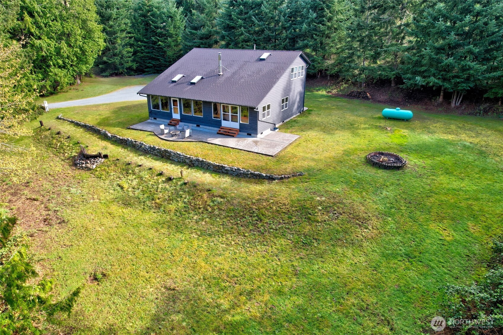 2101 Wagner Road Camano Island, WA 98282 - Photo 31 of 36 a view of a house with a swimming pool