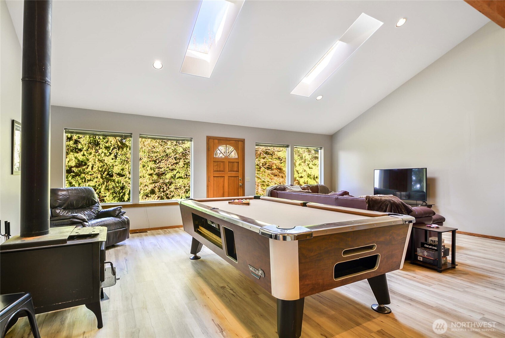 2101 Wagner Road Camano Island, WA 98282 - Photo 5 of 36 a room with a large window and furniture