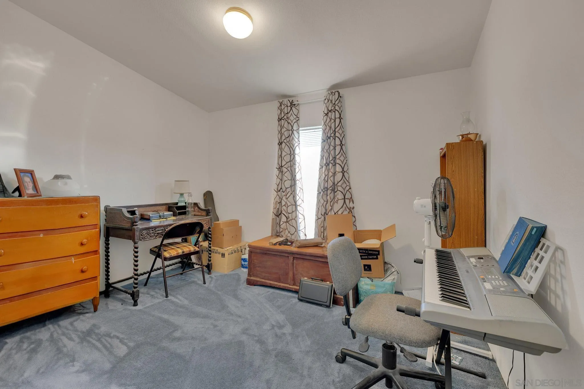 2030 Black Canyon Road, Unit 29 Ramona, CA 92065 - Photo 23 of 35 a living room with furniture and a window