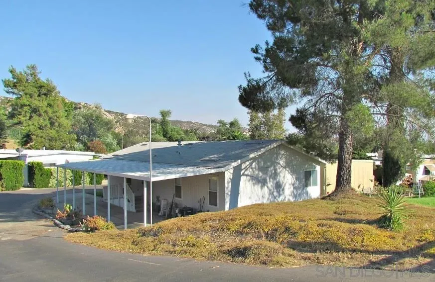 2030 Black Canyon Road, Unit 29 Ramona, CA 92065 - Photo 29 of 35 a view of a house with a yard