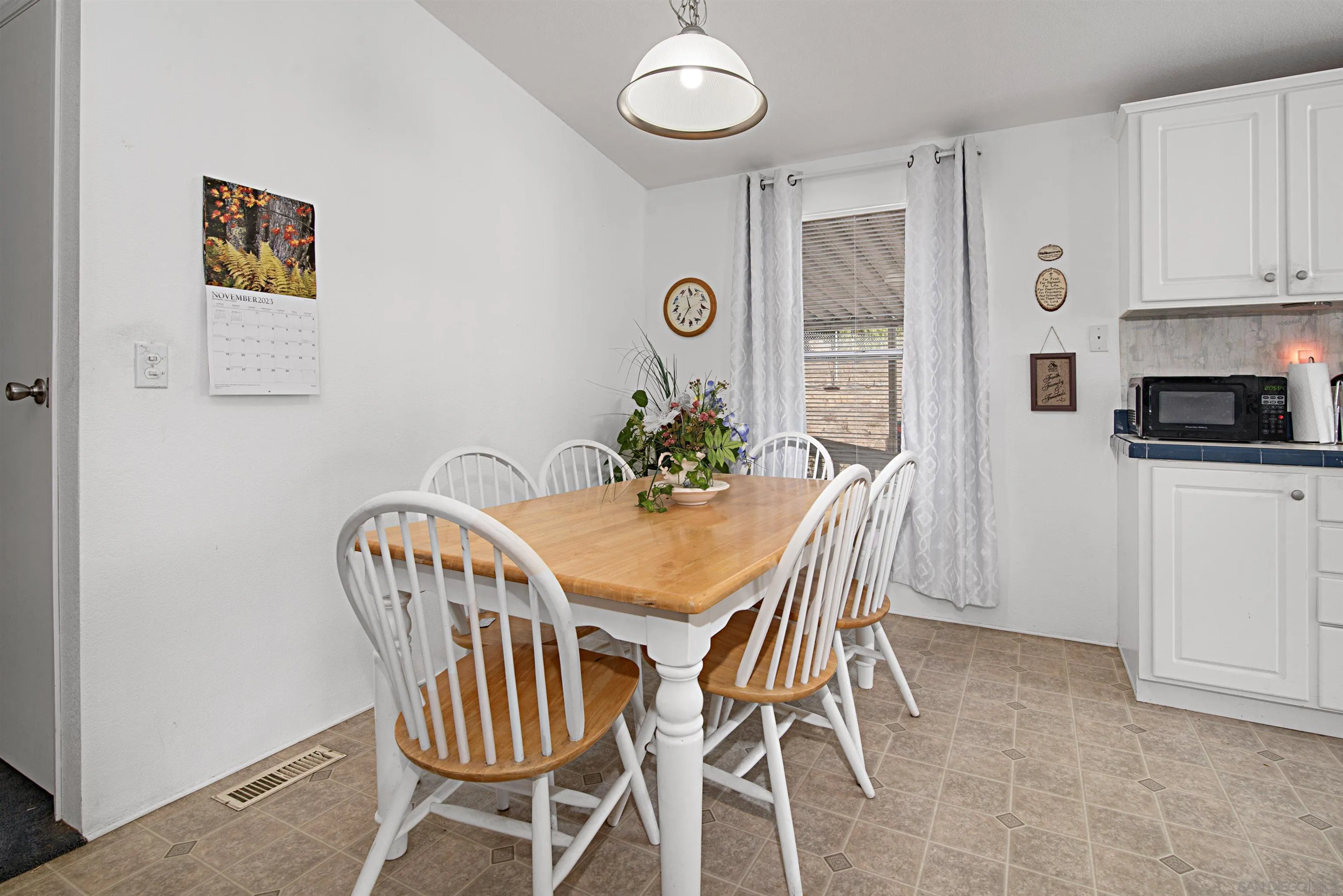 2030 Black Canyon Road, Unit 29 Ramona, CA 92065 - Photo 9 of 35 a view of a dining room with furniture