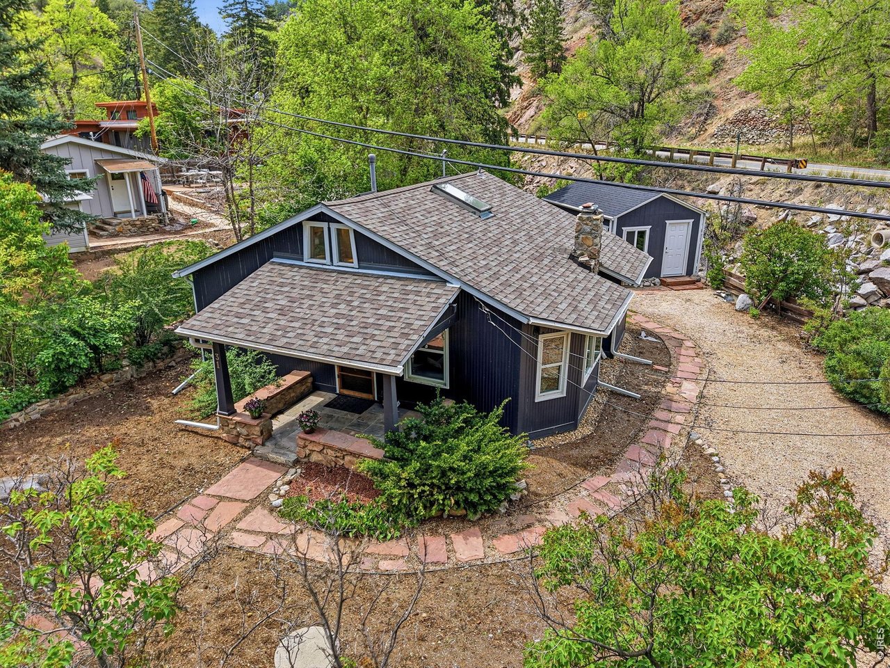 31 Silver Spruce Boulder, CO 80302 - Photo 42 of 50 Driveway can fit up to 3 cars plus parking in front of the home.