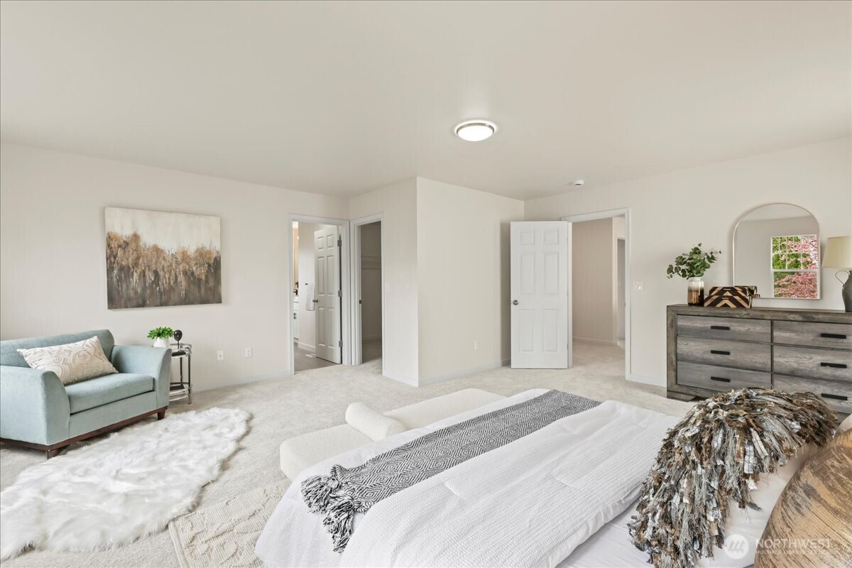 401 Graham Avenue Northeast Renton, WA 98059 - Photo 23 of 40 a bedroom with a bed and furniture