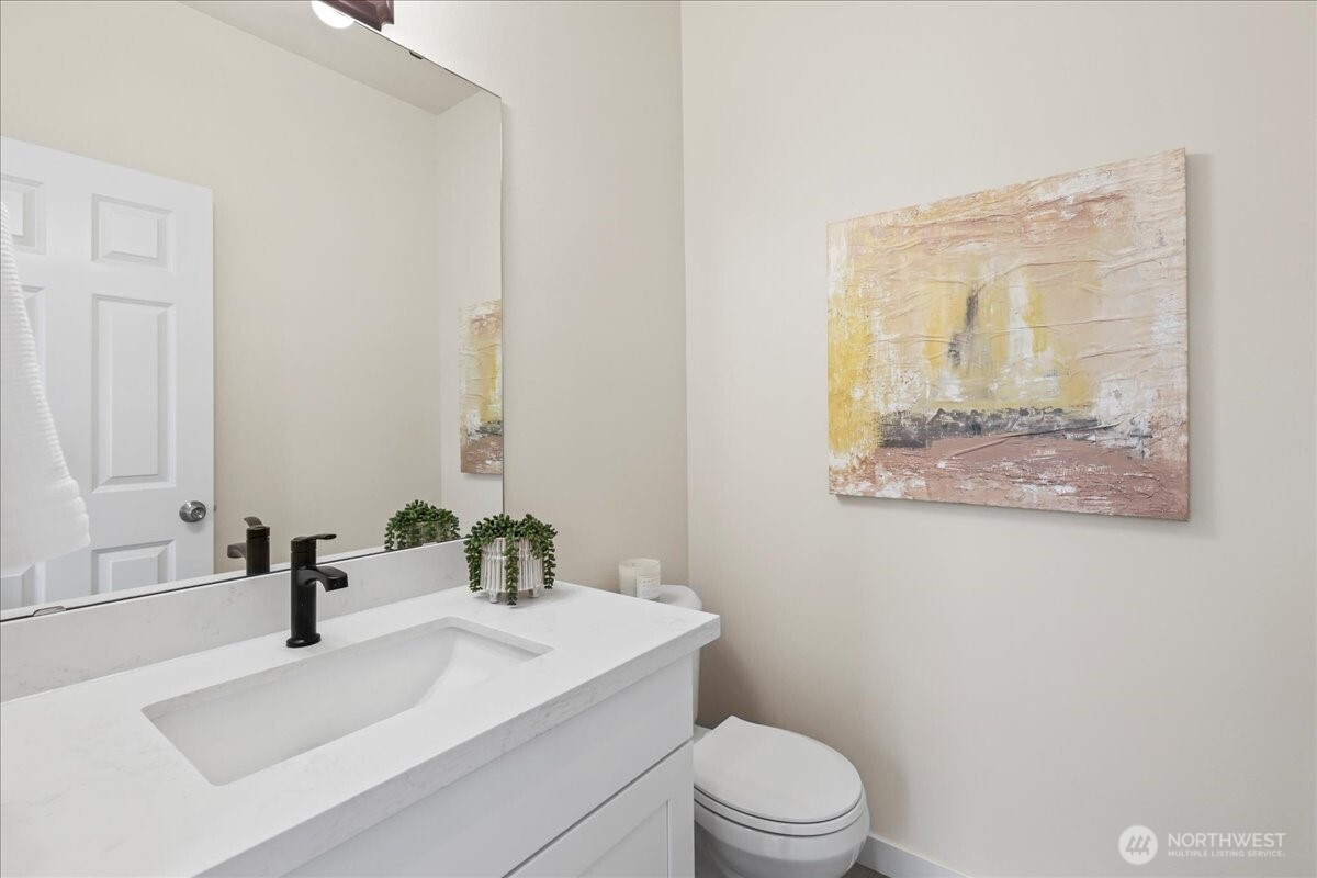 401 Graham Avenue Northeast Renton, WA 98059 - Photo 28 of 40 a bathroom with a sink a toilet and shower