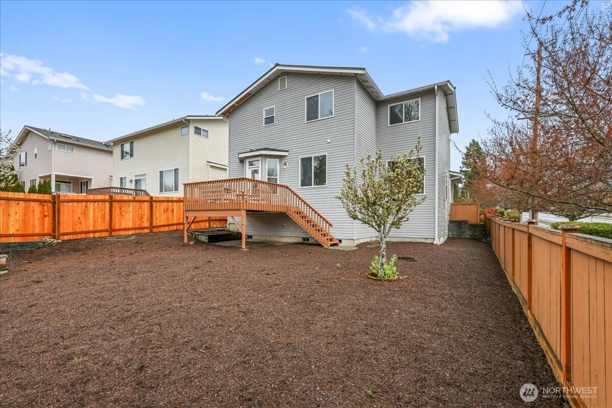 401 Graham Avenue Northeast Renton, WA 98059 - Photo 3 of 40 a house view with a garden space