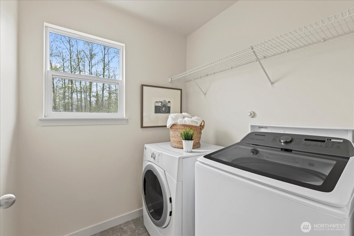 401 Graham Avenue Northeast Renton, WA 98059 - Photo 35 of 40 a utility room with dryer and washer