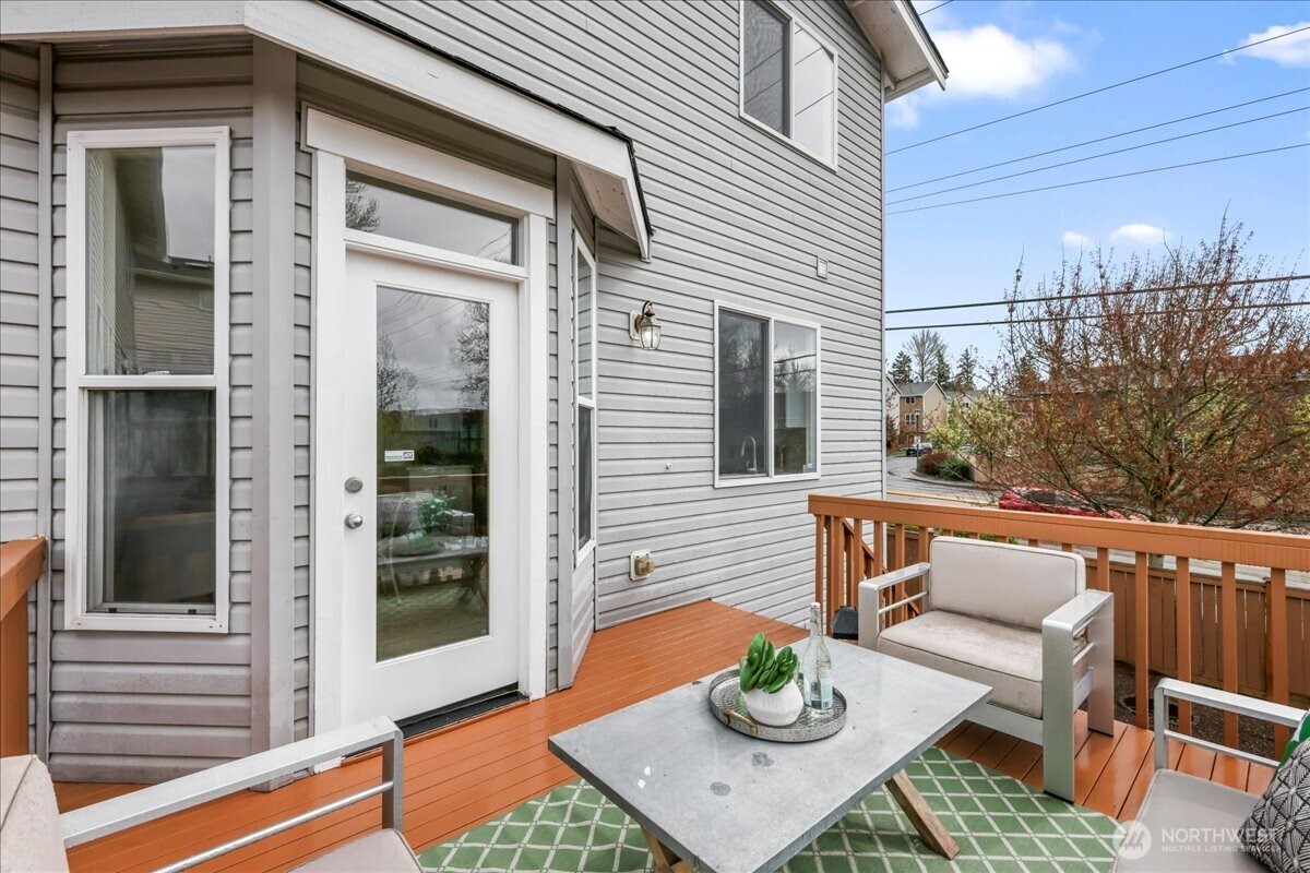 401 Graham Avenue Northeast Renton, WA 98059 - Photo 5 of 40 a view of a patio with couches table and chairs and potted plants