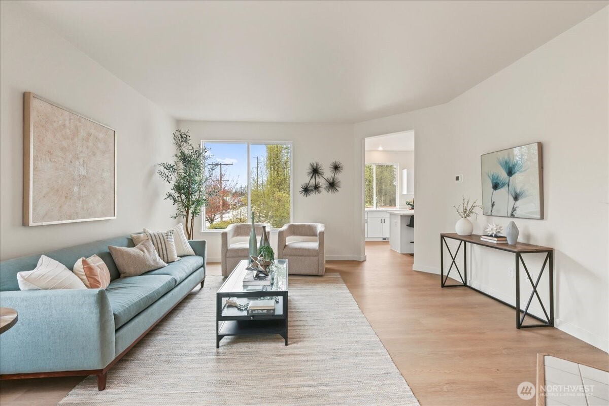 401 Graham Avenue Northeast Renton, WA 98059 - Photo 9 of 40 a living room with furniture and a table